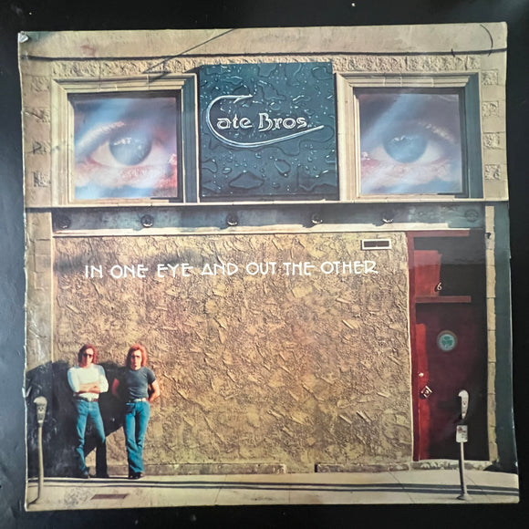 Cate Bros. - In One Eye And Out The Other